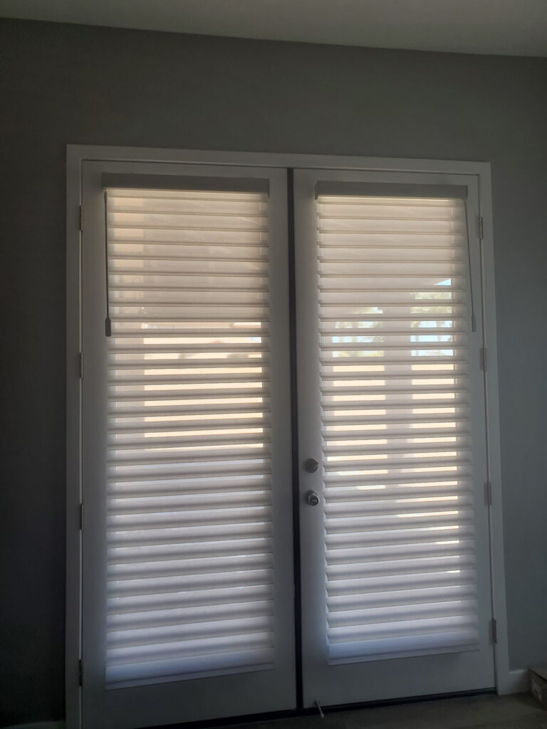 Experience ultimate convenience with custom motorized fabric roller shades. Designed for the modern home, they roll up tightly to preserve your view and lower smoothly at the touch of a button.
